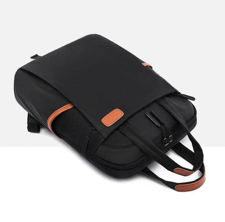 Anti-theft work backpack for women, sleek design, protects essentials on daily commute.