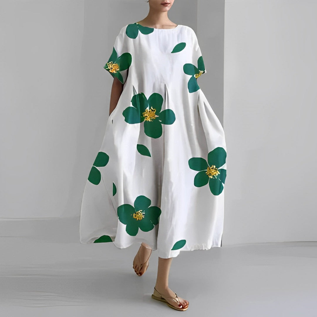 Relaxed fit women's short sleeve midi dress featuring a unique artistic print.