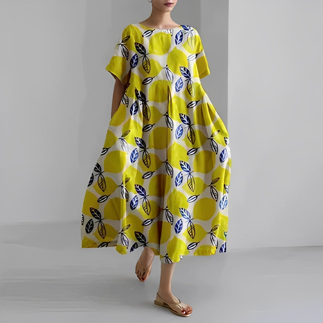 Stylish women's vacation midi dress with a colorful artistic print & relaxed, flowy silhouette.