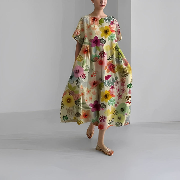 Everyday style women's relaxed midi dress featuring a beautiful artistic print and pockets.