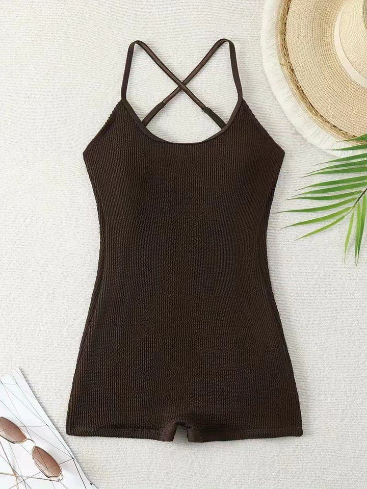 Women's athletic ribbed monokini, a sleek tank style one-piece swimsuit for sporty activewear & beach fun.