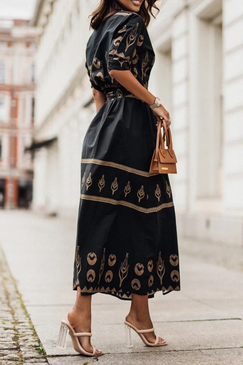 Stylish women's Aztec print midi dress. Button-down, belted & flared design offers a unique, versatile look.
