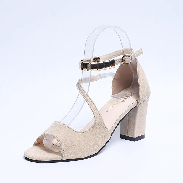 Versatile women's block heel sandals with beaded ankle strap, perfect for both dressy and casual looks.