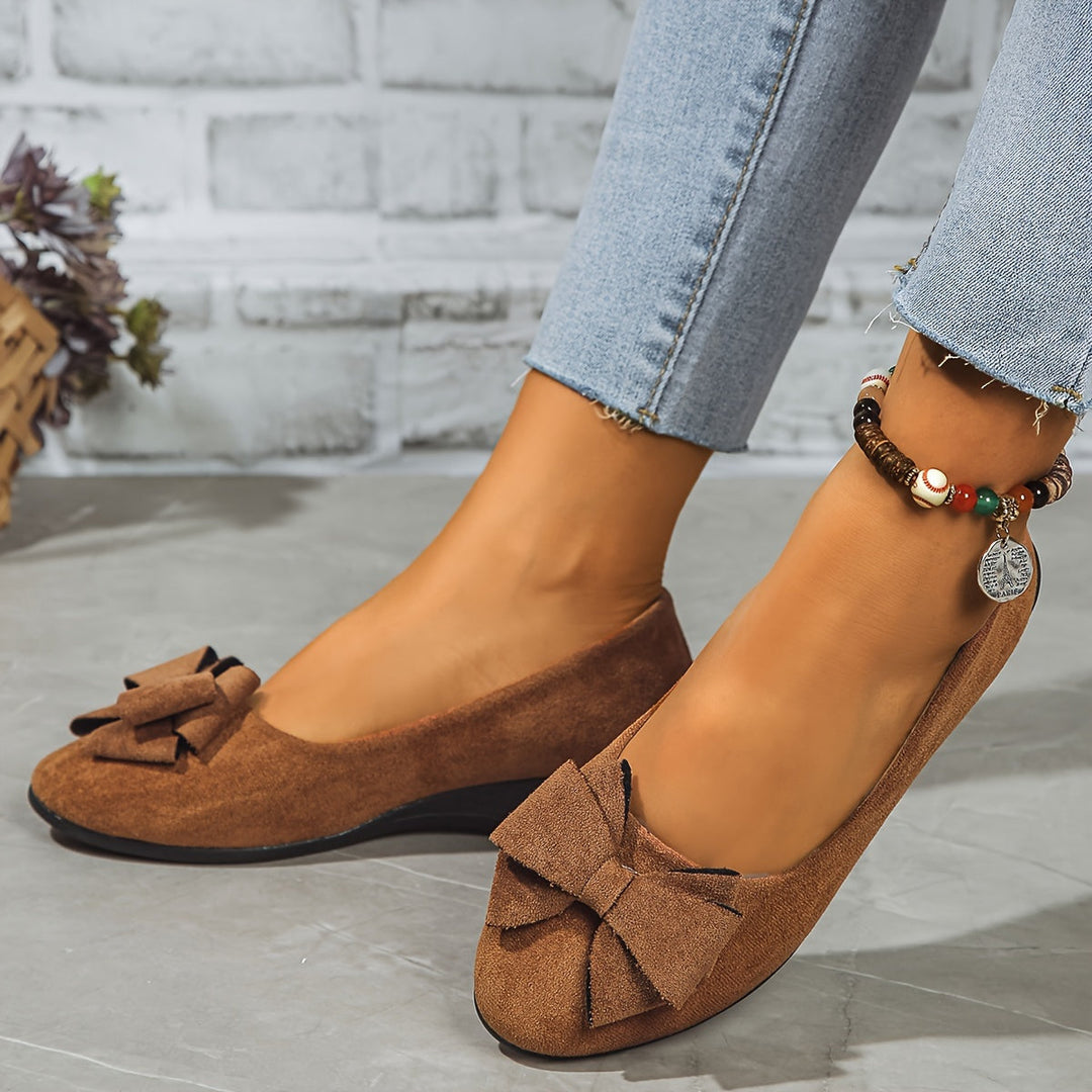 Women's versatile casual slip-on wedge flats, round toe with an elegant bow.