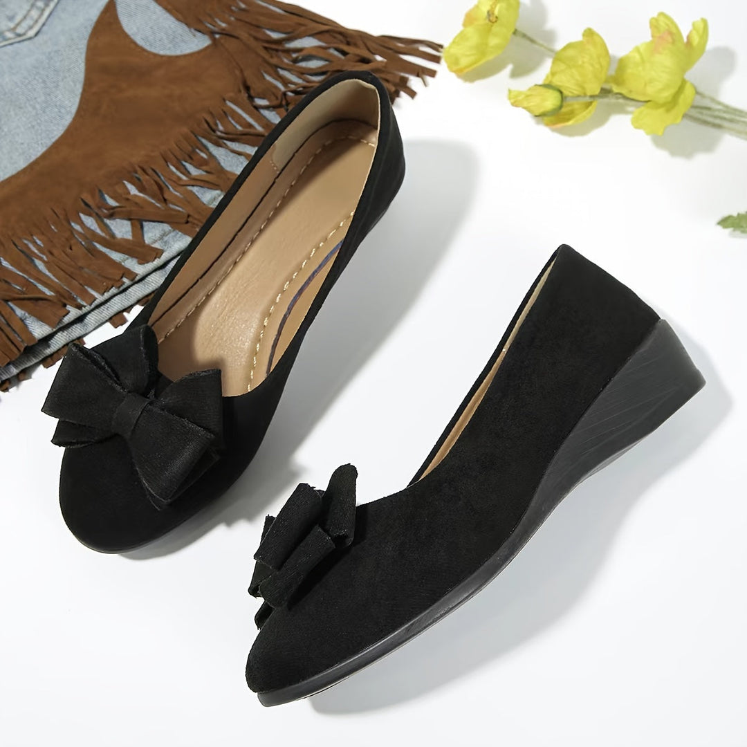 Easy slip-on women's wedge ballet flats, comfortable round toe & charming bow.