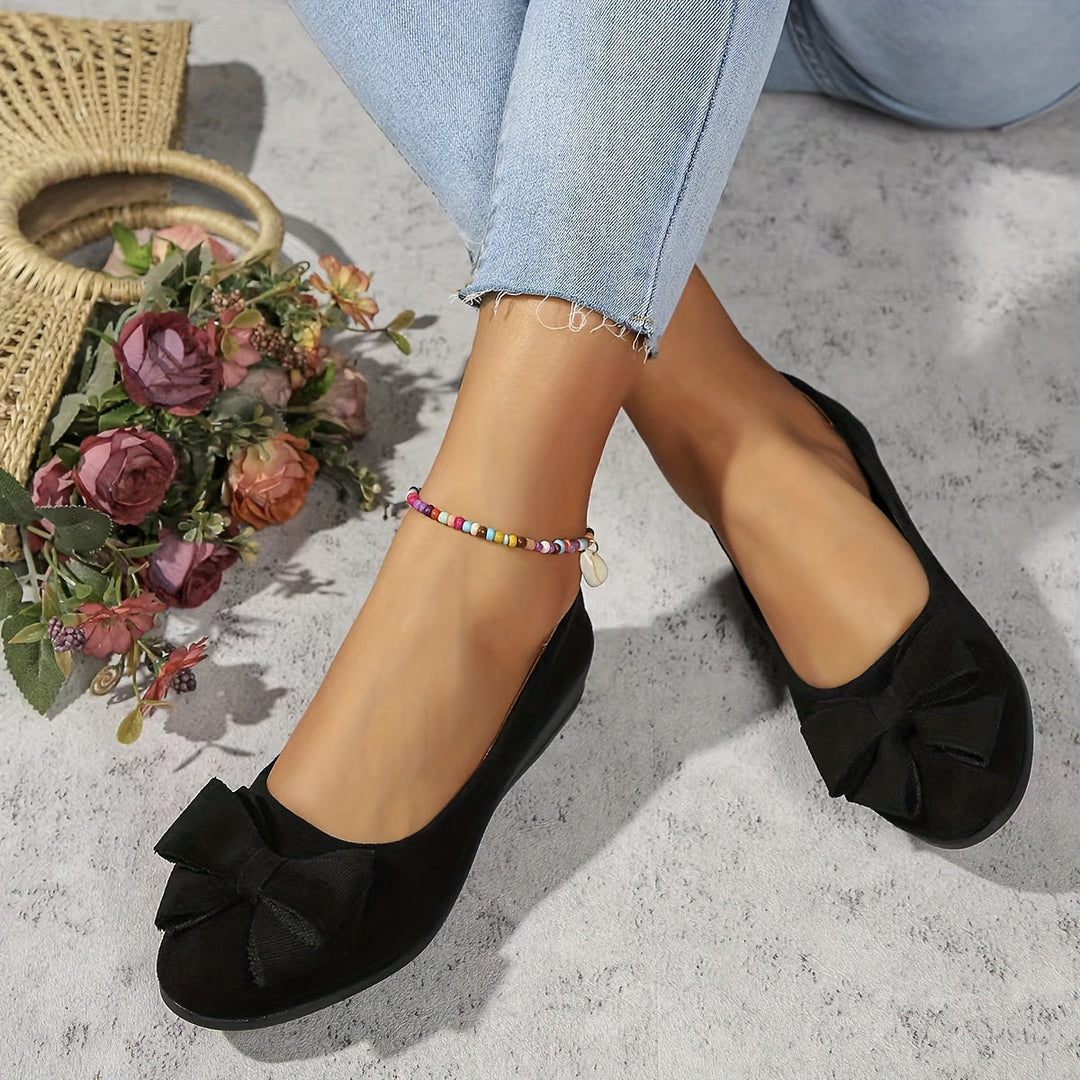 Stylish women's everyday wedge flats, round toe slip-on with a pretty bow.