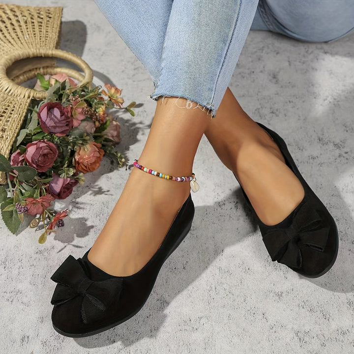 Stylish women's everyday wedge flats, round toe slip-on with a pretty bow.