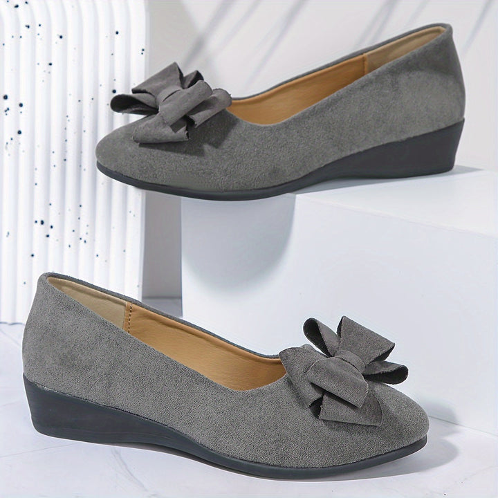 Classic women's bow detail ballet flats, comfortable slip-on wedge, round toe.