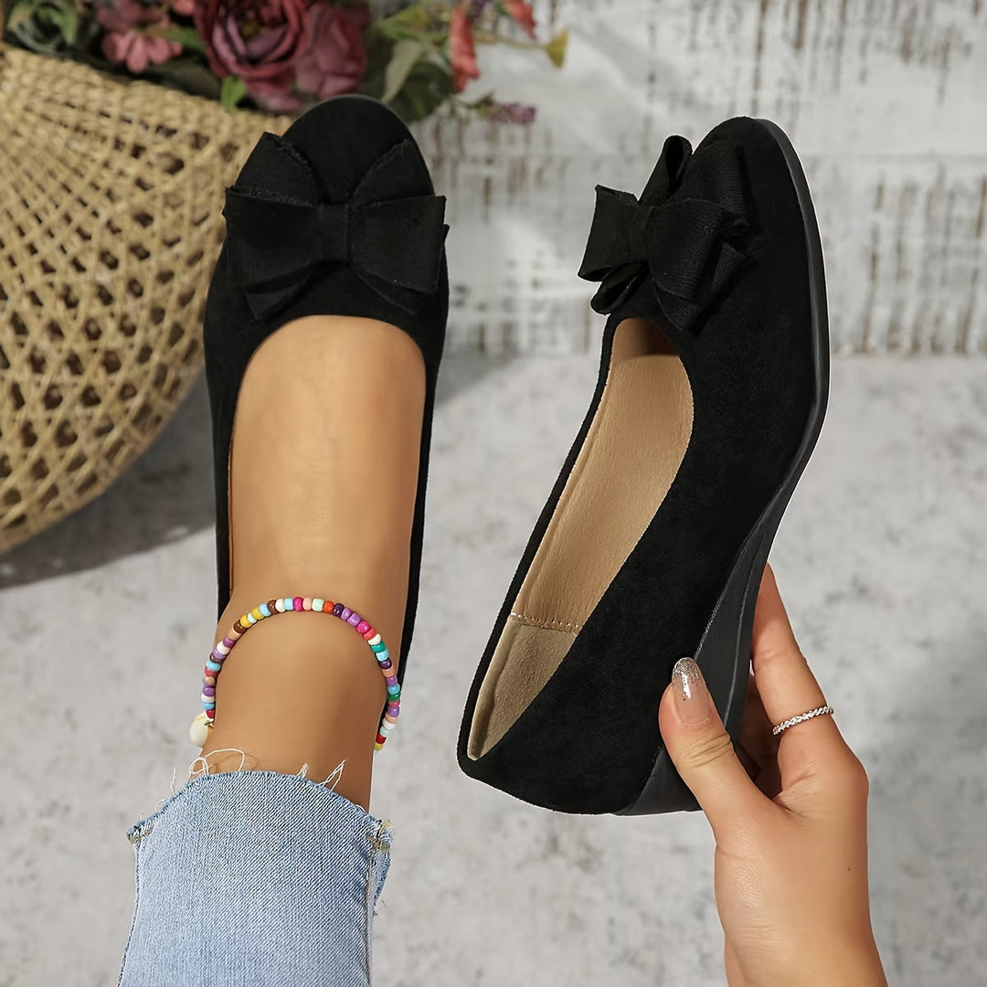 Women's feminine bow detail wedge flats, round toe, easy slip-on style.