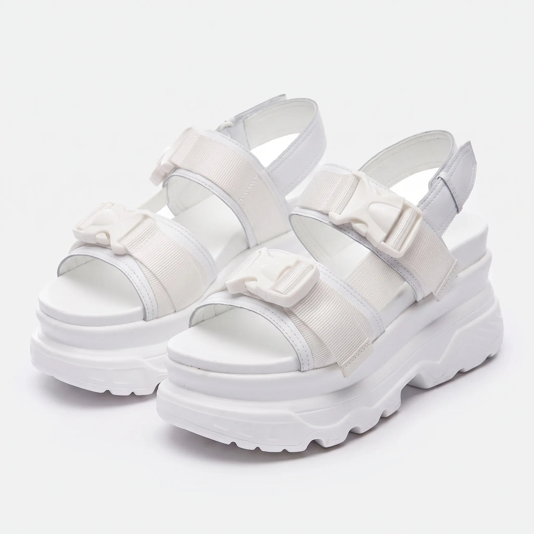 Elevated women's chunky platform sandals offering comfortable, stylish summer footwear with an open-toe design.