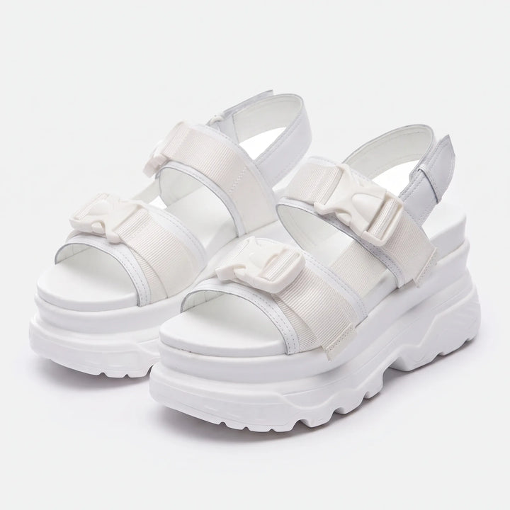 Elevated women's chunky platform sandals offering comfortable, stylish summer footwear with an open-toe design.