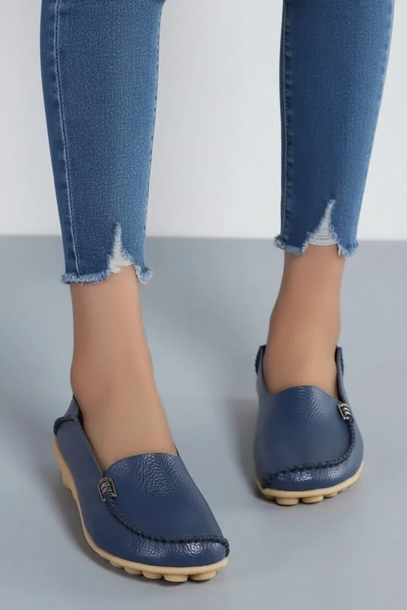 Stylish women's beige round-toe flats with superior cushioning, ideal for casual wear, travel & everyday style.