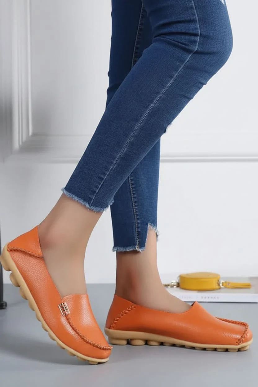 Elegant women's grey cushioned round-toe flats, offering versatile style for everyday casual wear & travel.