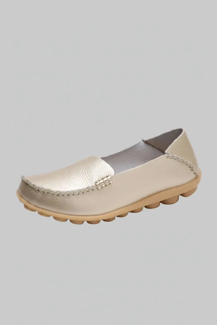 Detail of cushioned insole in women's comfortable round-toe flats, perfect everyday shoes for long walks.