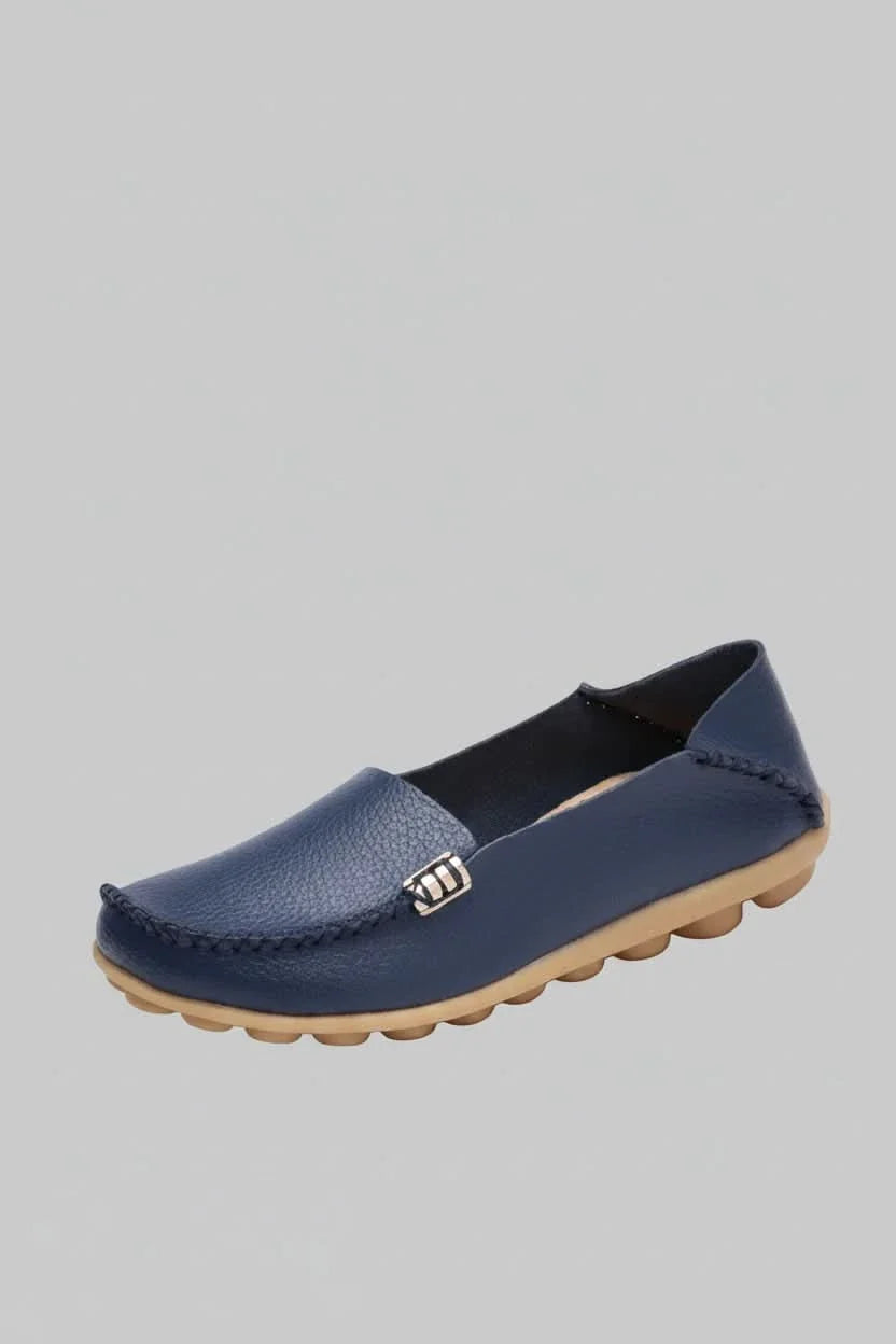 Women's versatile brown round-toe flats, cushioned for all-day comfort, ideal as everyday & travel shoes.