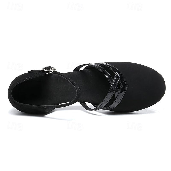 Stylish women's black dance shoes featuring a secure & adjustable ankle strap, ensuring comfort for ladies' versatile use.