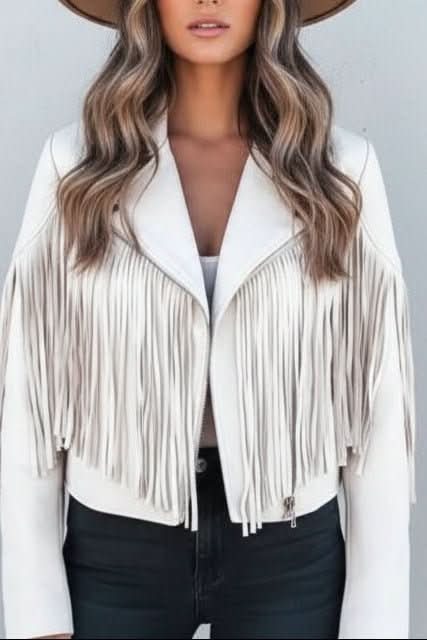 Fashionable women's fringed moto jacket, ideal for concert outfits or a chic, everyday edgy look.