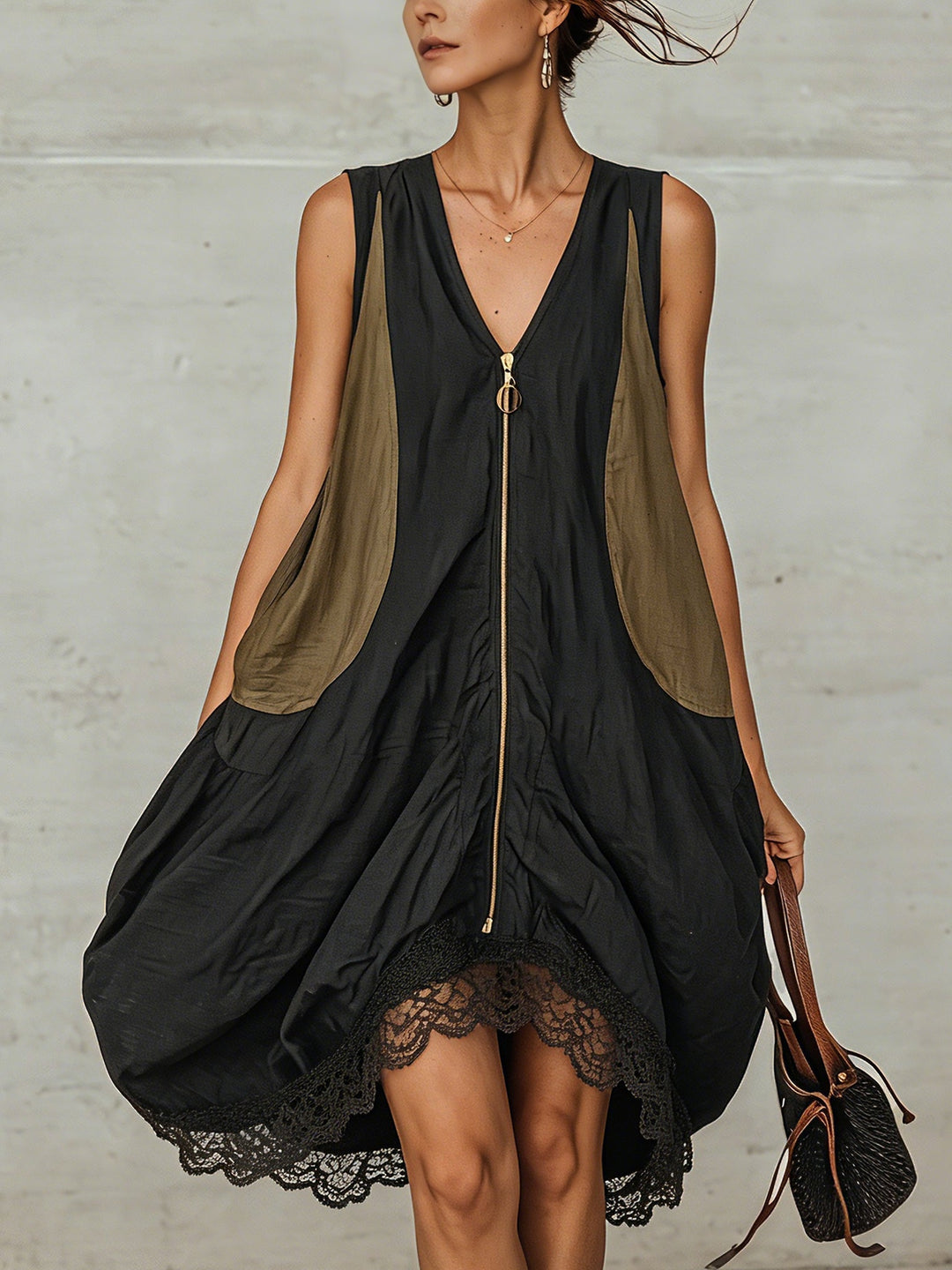 Women's black midi dress with V-neck, zip front, and delicate lace hem. Perfect for elegant spring/summer style.