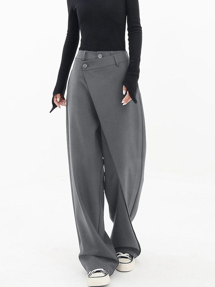 Versatile black women's Monroe Baggy Trousers, relaxed wide leg, asymmetric design for casual or semi-casual wear.