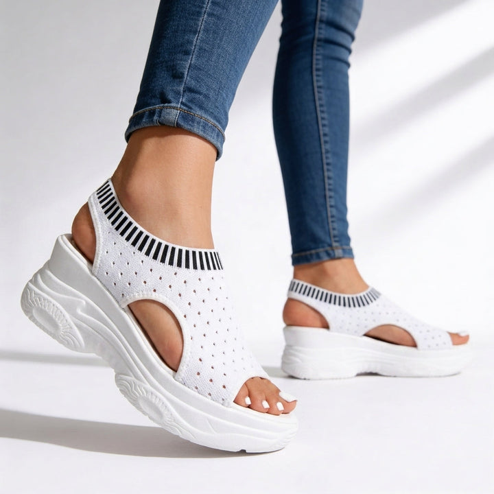 Comfortable women's white peep toe wedge platform sandals, offering support for walking and summer activities.