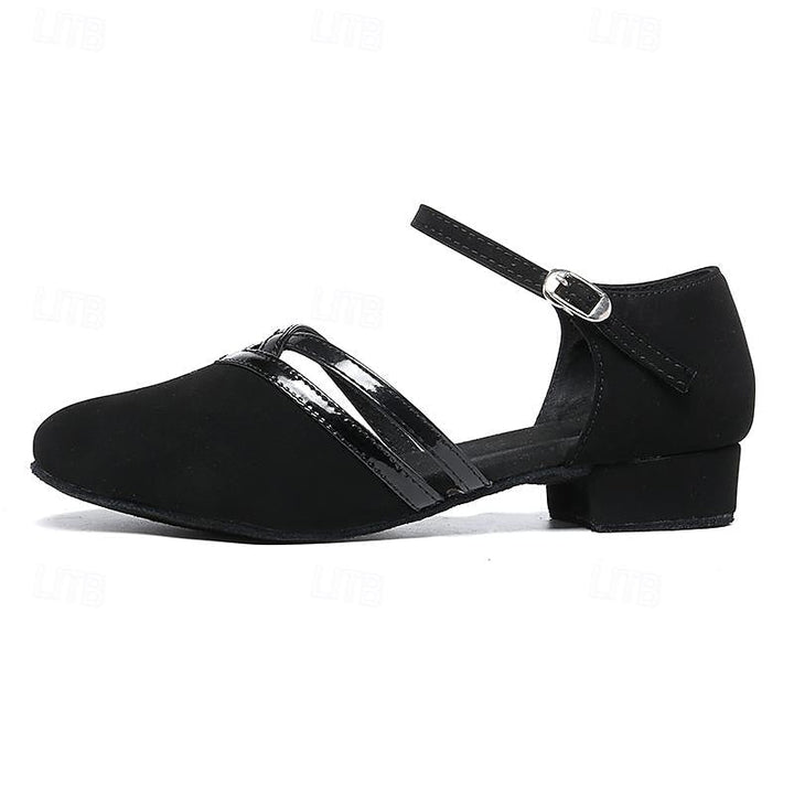 Graceful ladies' performance footwear, black with ankle strap, ideal for stage and dance practice.