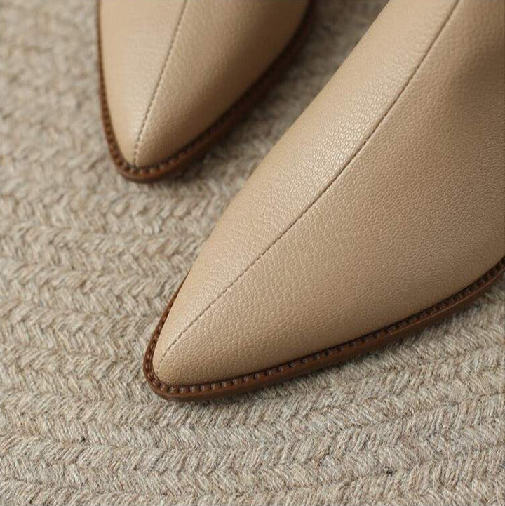 Everyday women's ankle boots, slip-on, low heel, pointed toe style, comfortable and chic for any outfit.