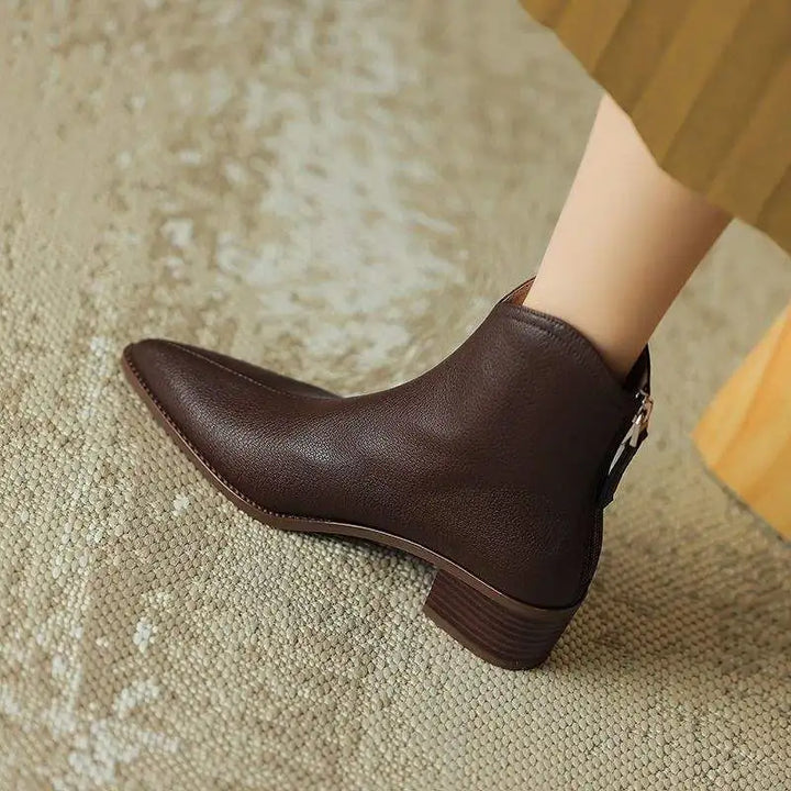 Chic women's pointed toe slip-on ankle boots, elegant low heel for versatile office and everyday fashion.