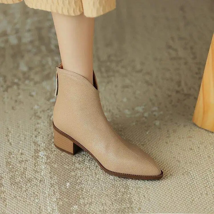 Women's fashion pointed toe ankle boots, low heel slip-ons, great with office attire and skirts.