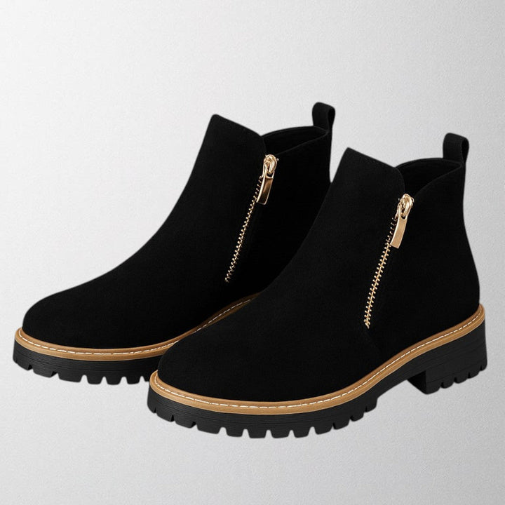 Black women's round toe side zip shoes with a sleek design. Perfect for everyday, office, or evening footwear.