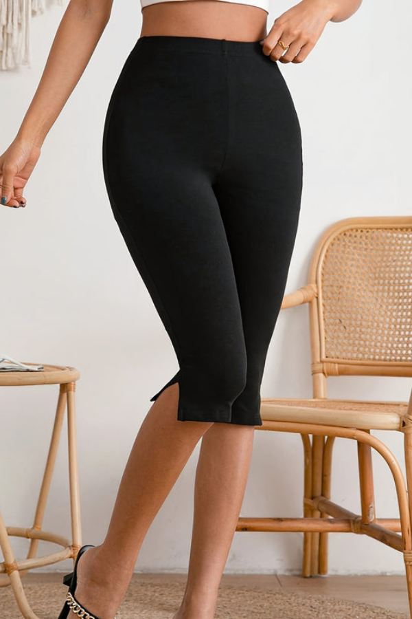 Versatile black women's stretch cropped pants. Slim fit design and comfort for summer, work or casual outings.