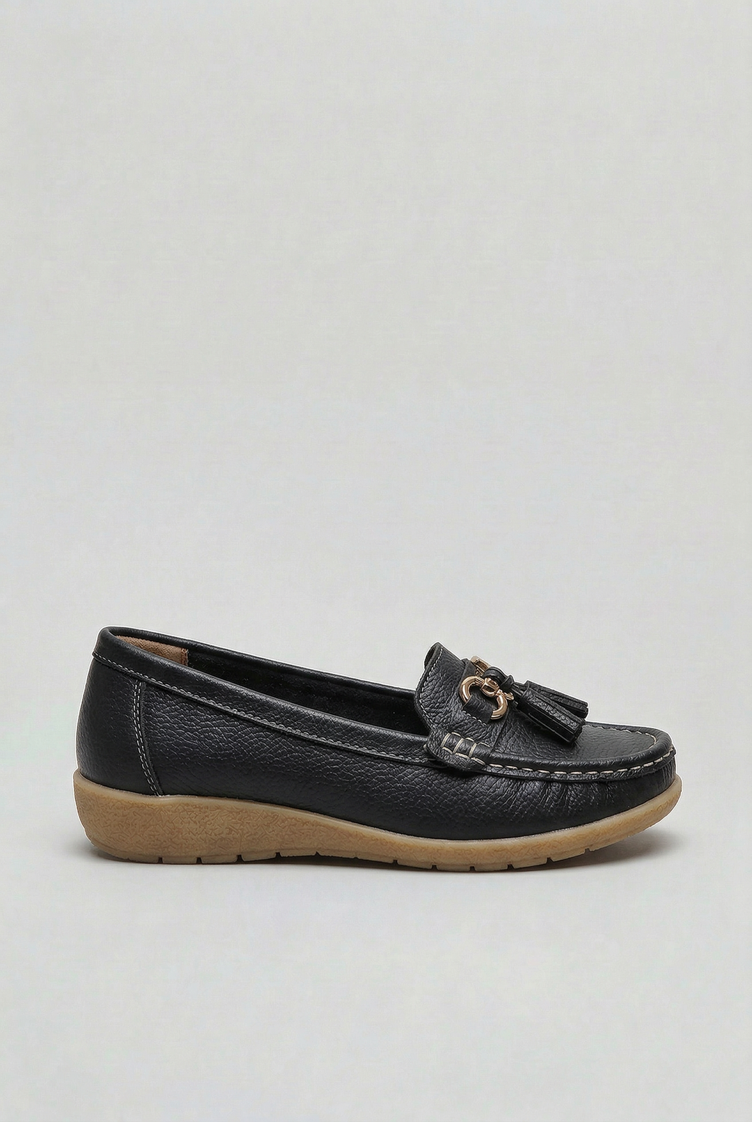 Top view of women's cushioned slip-on loafers, comfortable flat shoes for casual style.