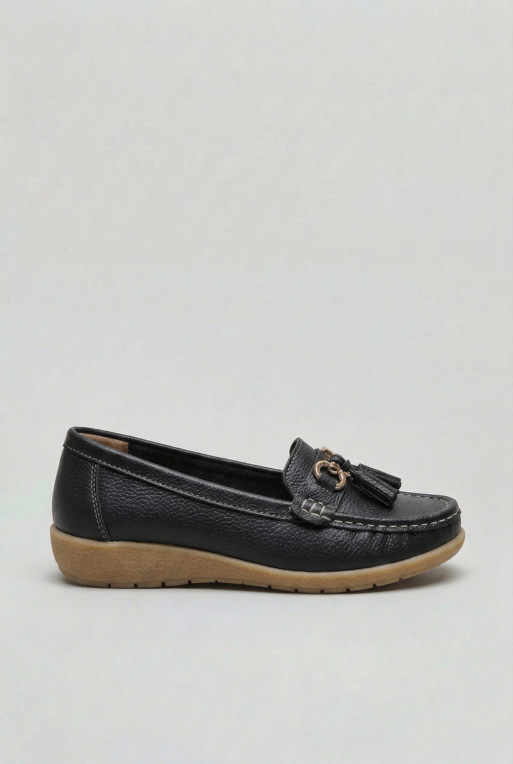 Top view of women's cushioned slip-on loafers, comfortable flat shoes for casual style.