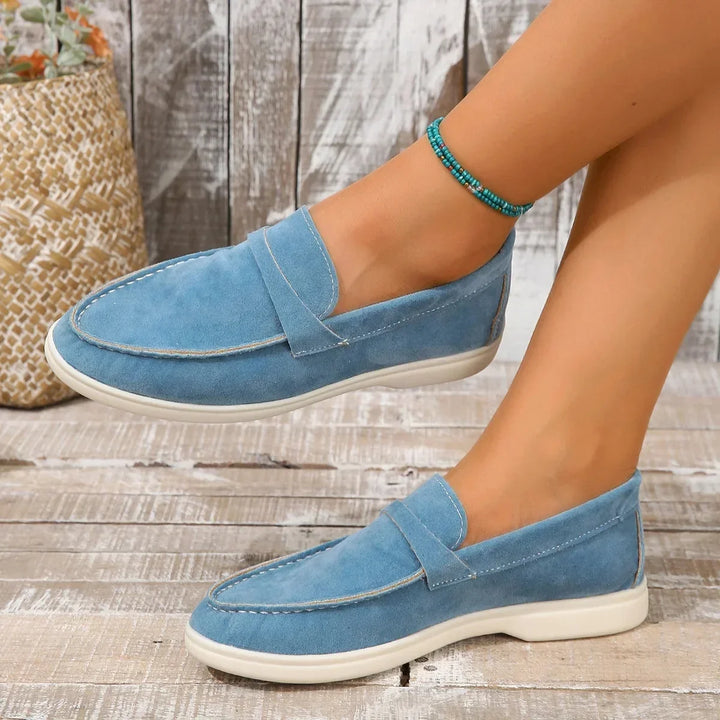 Soft women's slip-on loafers, featuring a supportive cushioned insole for daily wear.
