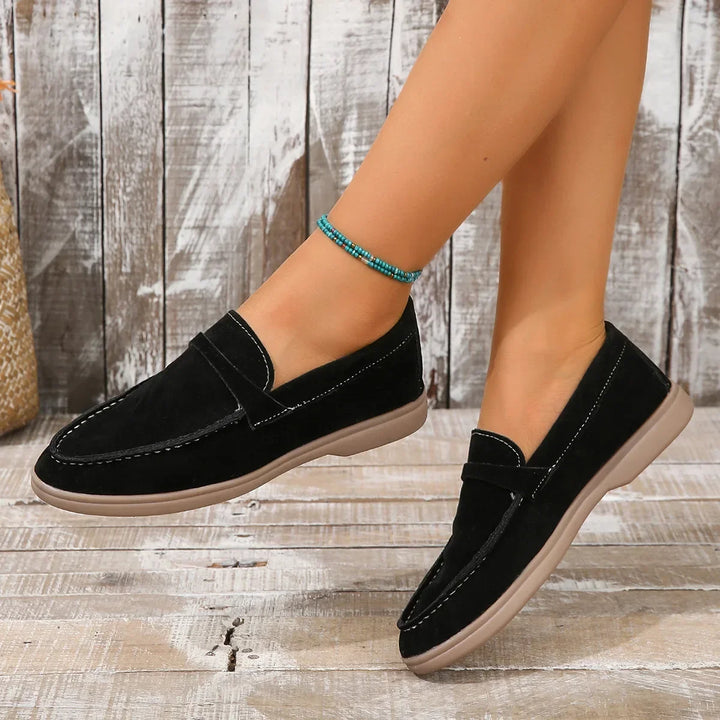 Modern women's slip-on loafers, ideal for office professionals & comfortable casual style.