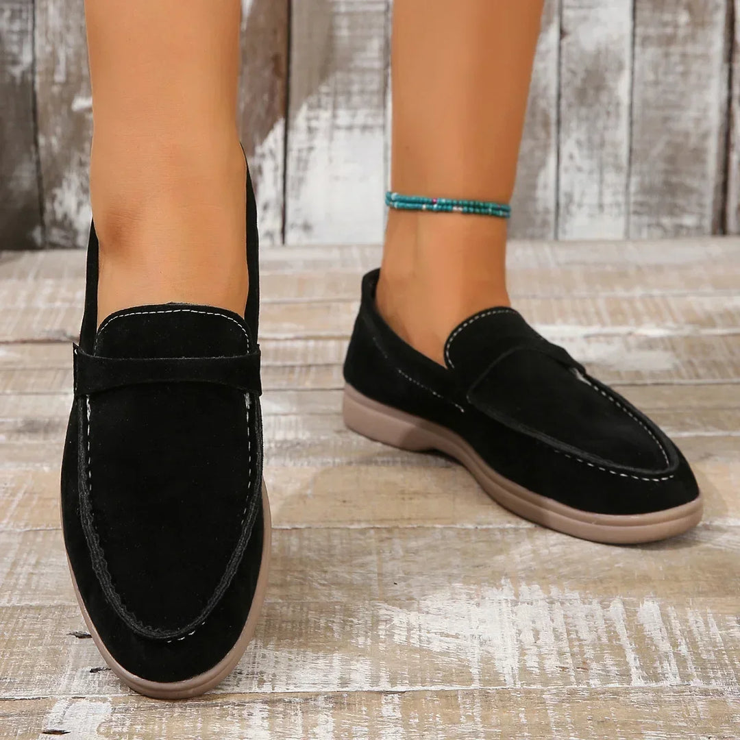 Women's comfortable flat loafers, slip-on design with cushioned support for long days.