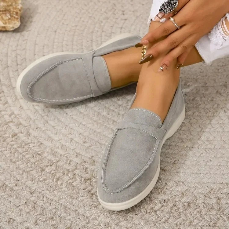Elegant women's flat loafers with cushioned insole, ideal for office or casual outfits.
