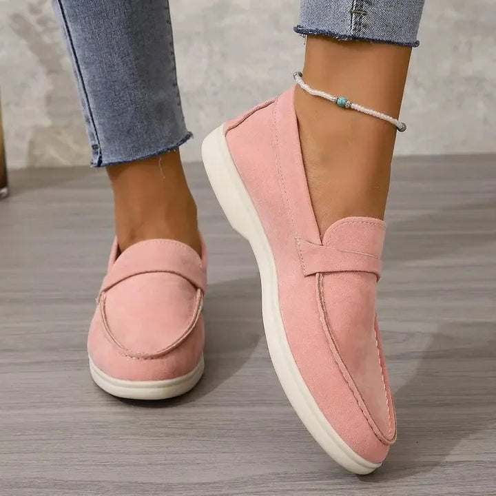 Women's stylish slip-on flat shoes, perfect for office elegance or casual comfort.