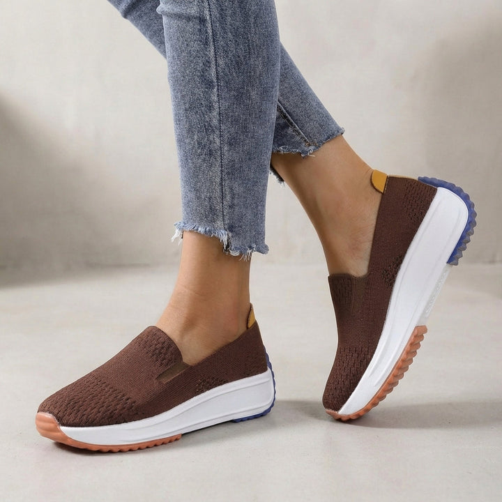 Orthopedic women's slip-on platform sneakers, designed for ultimate comfort & supportive walking, modern style.