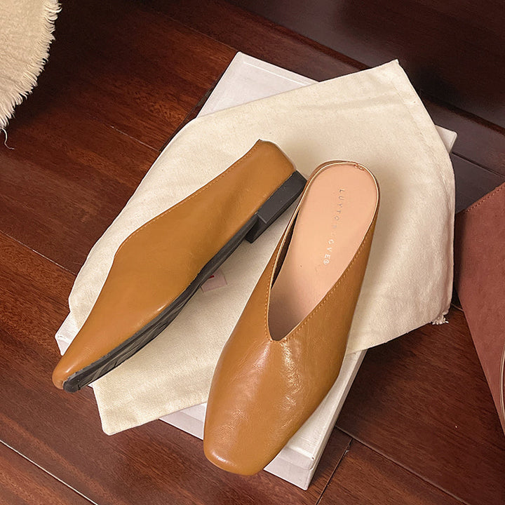 Stylish women's slip-on flats in vegan leather, perfect for office or casual elegant wear.