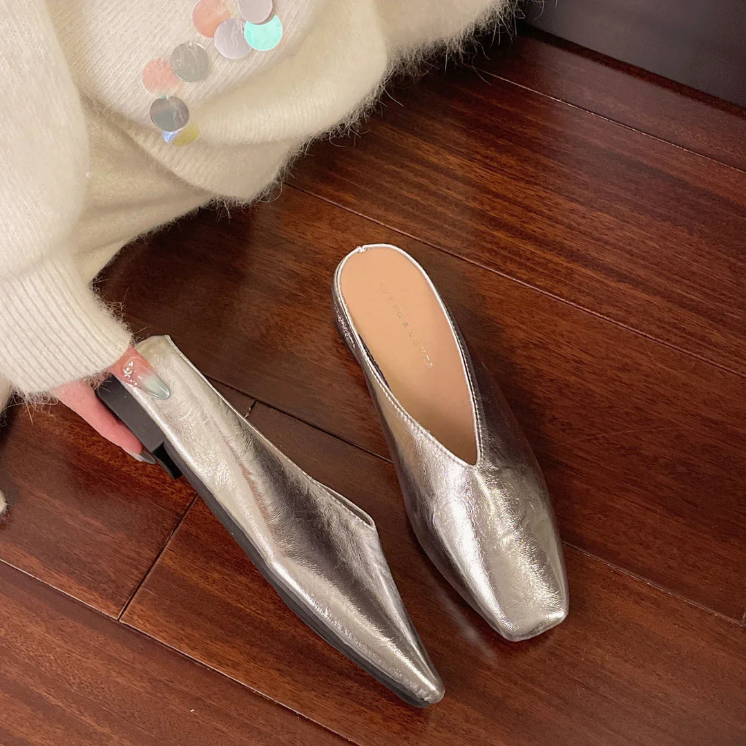 Elegant women's low-cut slip-on flats, made with vegan leather for comfortable, stylish office wear.