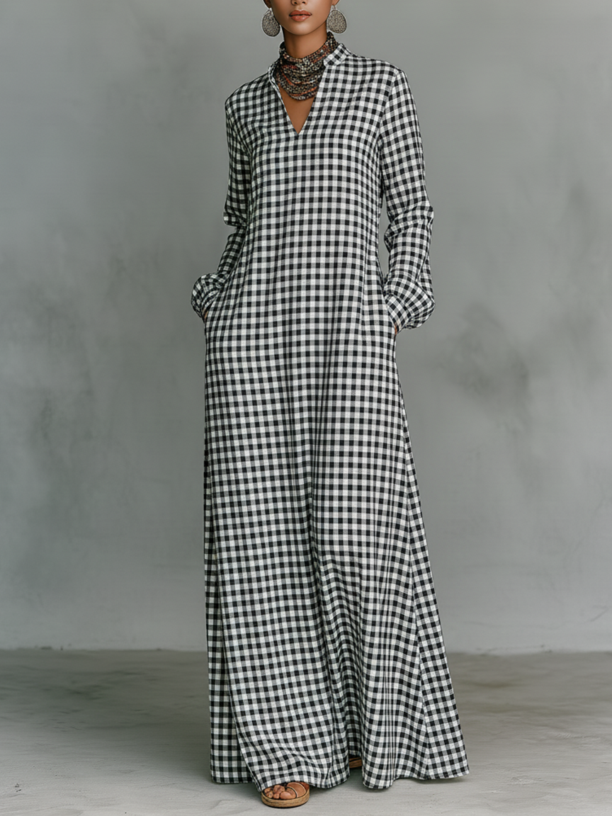 Women's black & white gingham check maxi dress with V-neck, long sleeves. Casual, flowy A-line for spring/summer.