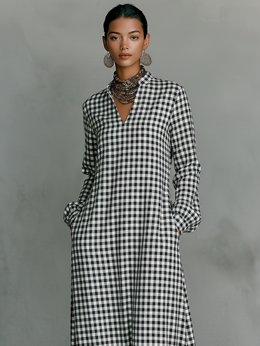 Elegant women's gingham maxi dress, V-neck, long sleeves, comfortable for everyday chic. Perfect spring fashion.