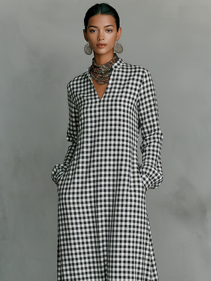 Elegant women's gingham maxi dress, V-neck, long sleeves, comfortable for everyday chic. Perfect spring fashion.