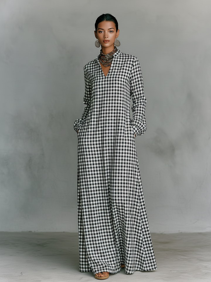 Stylish women's black & white gingham check maxi dress, V-neck & long sleeves. Ideal for spring and summer comfort.