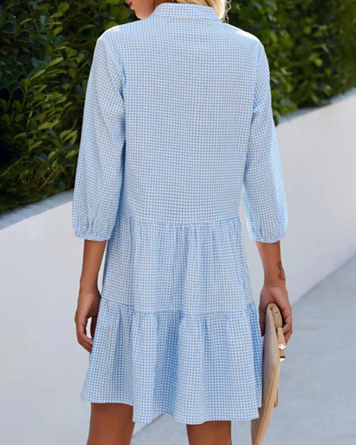 Versatile women's blue check casual summer dress, offering comfort and style for everyday wear or occasions.