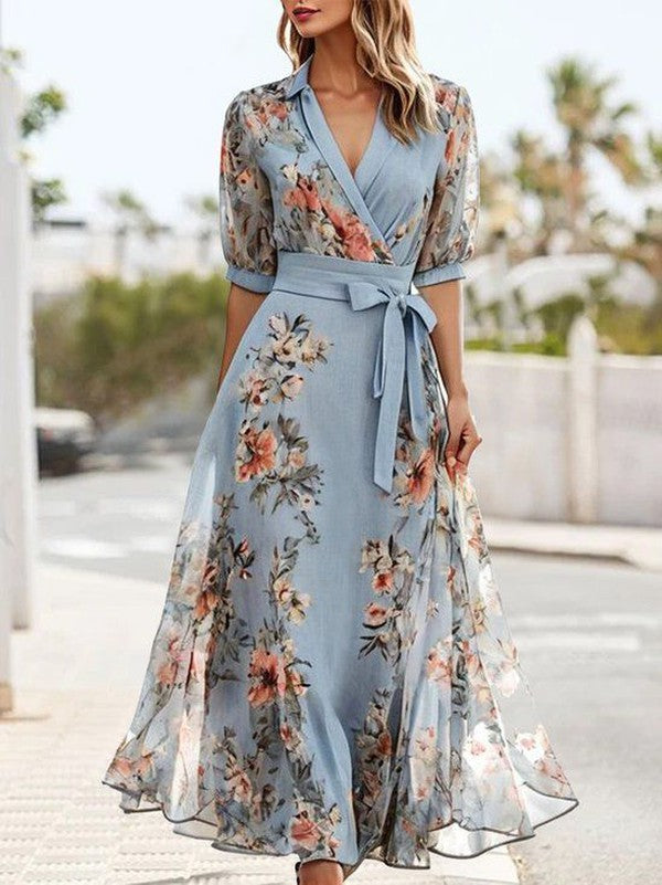 Women's blue floral wrap maxi dress with V-neck, puff sleeves, and tie waist, perfect for summer or wedding guests.