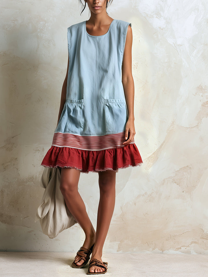 Sleeveless blue tiered mini dress for women, with playful ruffles & a stylish contrast hem. Casual day dress.