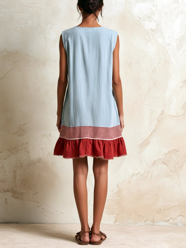 Women's casual blue mini dress. Ruffle tiered design with white contrast hem. Summer fashion, boho style.