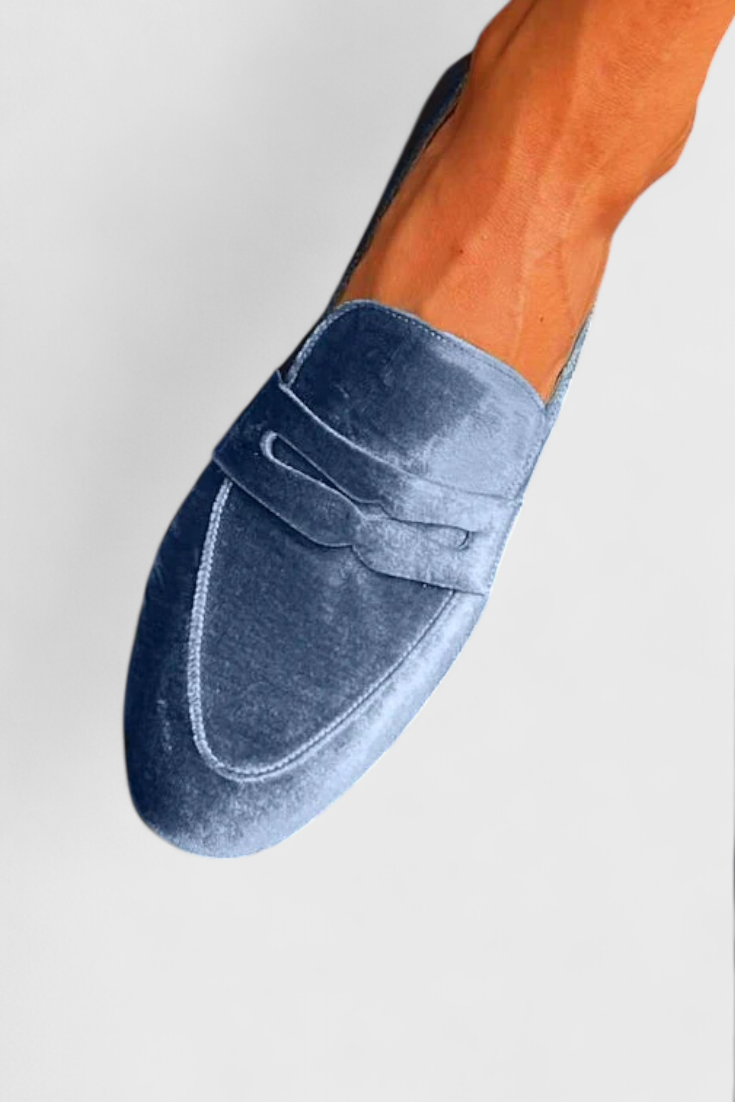 Effortless women's blue slip-on flats, designed for supreme comfort and easy casual everyday styling.