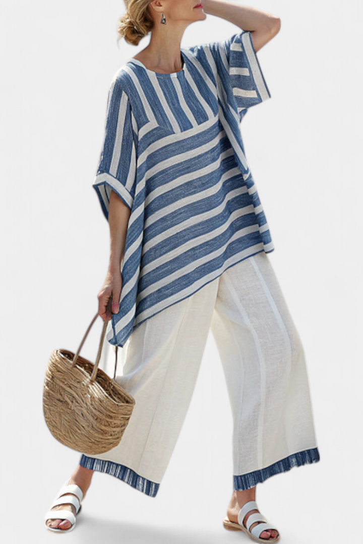Women's blue striped batwing top & wide-leg pant set. Perfect two-piece summer outfit for casual chic comfort.